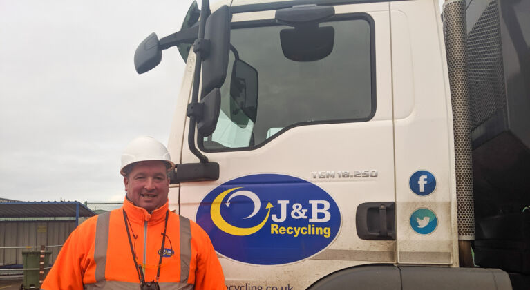 J&B Recycling lorry and man in PPE